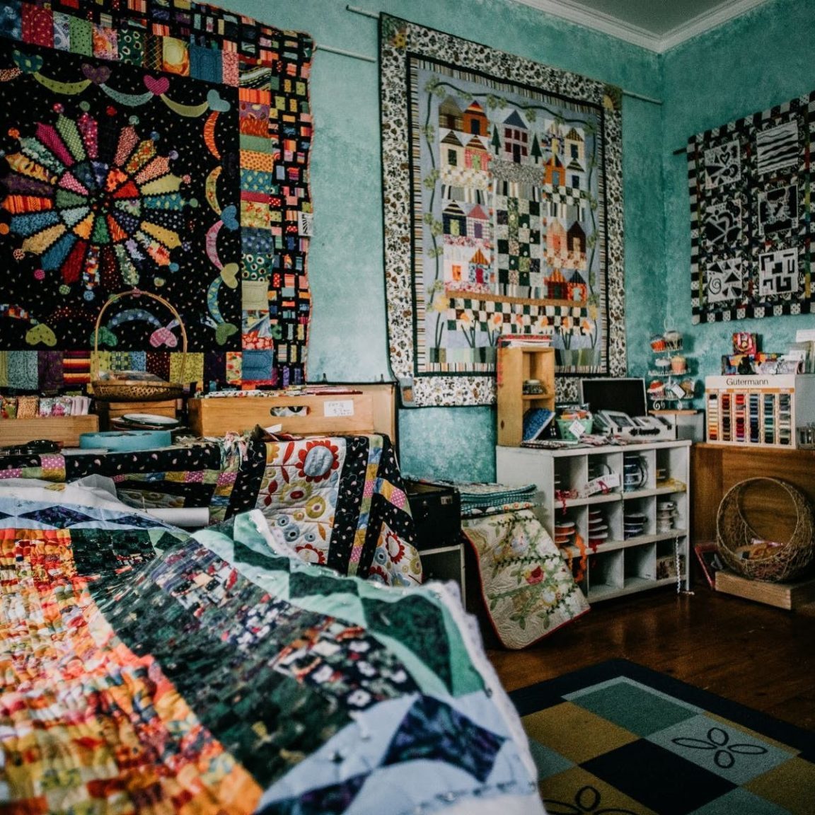 Image of room full of quilts